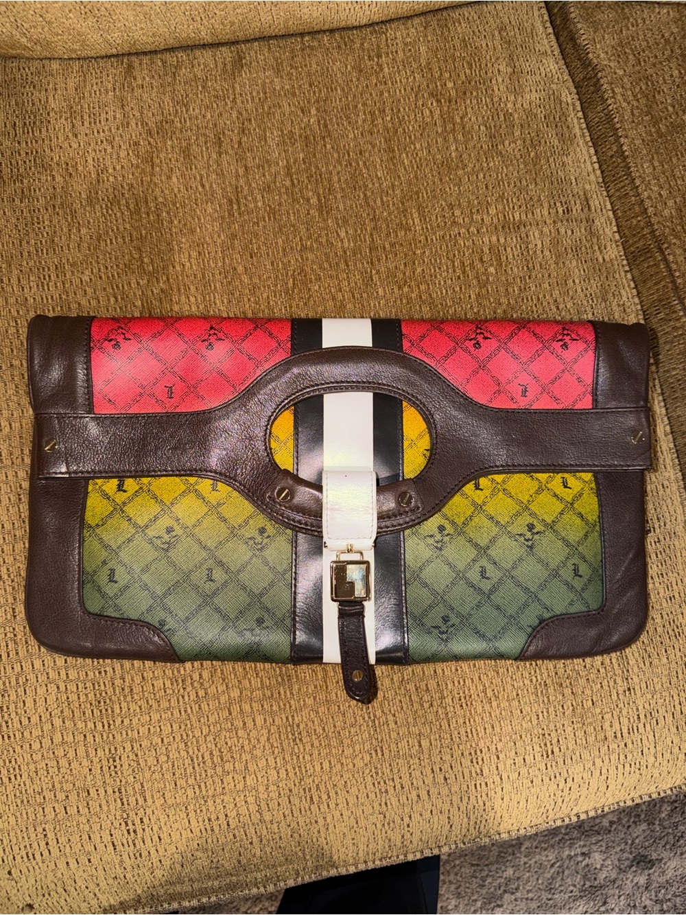 The L.A.M.B. by Gwen Stefani Rasta Carlisle clutch